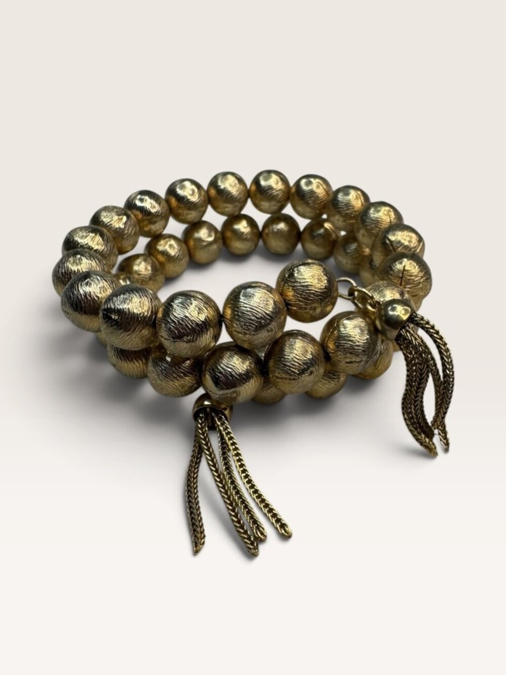 1960s Textured Gold Tone Brushed Ball Bead Wrap Memory Wire Tassel Bracelet